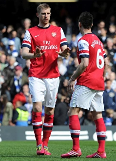 Chelsea V Arsenal 2013-14 Prints: Arsenal's Mertesacker and Koscielny Before Clash Against Chelsea