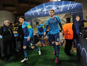 Monaco V Arsenal 2014/15 Prints: Arsenal's Mertesacker and Koscielny Prepare for Monaco Showdown in Champions League