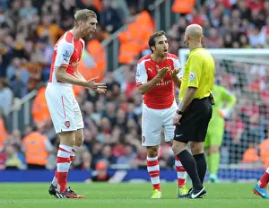 Arsenal V Hull City 2014-15 Prints: Arsenal's Per Mertesacker and Mathieu Flamini Protest to Referee during Arsenal v Hull City Match