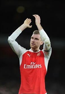 Arsenal v Manchester City 2015-16 Collection: Arsenal's Per Mertesacker Rallies Fans After Arsenal vs Manchester City (2015-16)