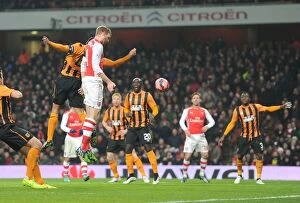 Images Dated 4th January 2015: Arsenal's Per Mertesacker Scores Heading Goal Against Hull City in FA Cup Third Round