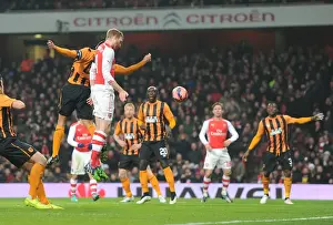 Arsenal V Hull City 2014-15 - FA Cup Prints: Arsenal's Per Mertesacker Scores Heading Goal Against Hull City in FA Cup Third Round