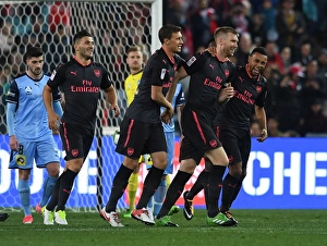 Arsenal's Per Mertesacker, Sead Kolasinac, Krystian Bielik, and Francis Coquelin Celebrate Goal in Sydney FC Friendly