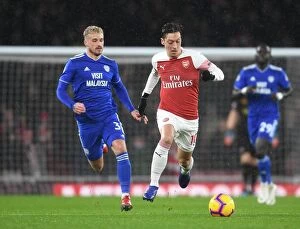 Arsenal v Cardiff City 2018-19 Collection: Arsenal's Mesut Ozil Scores Past Cardiff's Joe Bennett - Arsenal FC vs Cardiff City