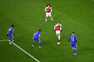 Images Dated 29th January 2019: Arsenal's Mesut Ozil Slices Through Cardiff Defense in Premier League Clash