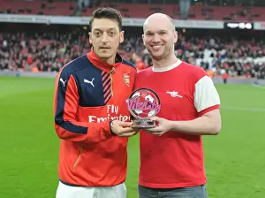 Arsenal V Chelsea 2015-16 Prints: Arsenal's Mesut Ozil Wins Player of the Month Amidst Intense Arsenal v Chelsea Rivalry (2015-16)