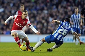 Images Dated 26th January 2013: Arsenal's Midfield Showdown: Jack Wilshere vs. Liam Bridcutt - FA Cup Clash between Arsenal
