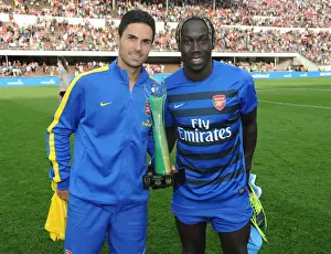 Arsenal's Mikel Arteta and Bacary Sagna: Post-Match Reunion Against Manchester City (2013)