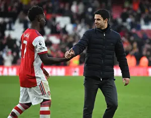 Arsenal's Mikel Arteta and Bukayo Saka Celebrate Victory Over Brentford