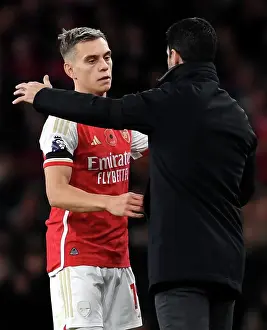 Arsenal's Mikel Arteta Embraces Leandro Trossard: Arsenal FC vs Burnley FC, Premier League 2023-24