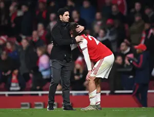 Arsenal V Chelsea 2019-20 Prints: Arsenal's Mikel Arteta Embraces Matteo Guendouzi Amidst Intense Arsenal v Chelsea Rivalry (2019-20)