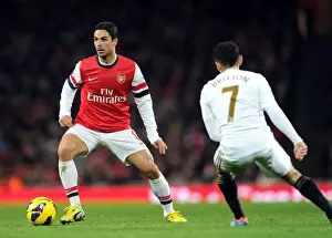 Arsenal V Swansea 2012-13 Prints: Arsenal's Mikel Arteta Fends Off Swansea's Leon Britton in 2012-13 Premier League Clash