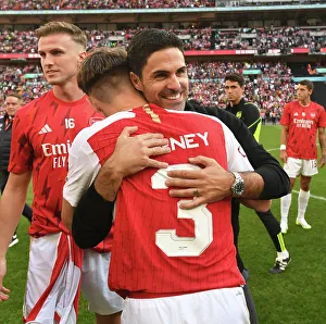 Arsenal V Manchester City - Community Shield 2023-24 Prints: Arsenal's Mikel Arteta and Kieran Tierney Celebrate Community Shield Victory over Manchester City