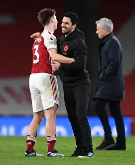 Arsenal's Mikel Arteta and Kieran Tierney Celebrate Victory Over Tottenham Hotspur