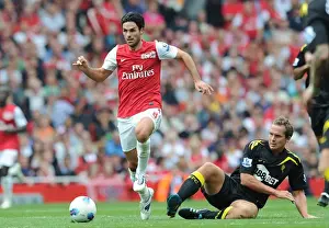 Arsenal V Bolton Wanderers 2011-12 Prints: Arsenal's Mikel Arteta Outmaneuvers Bolton's Kevin Davies in 2011-12 Premier League Clash