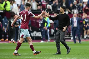 West Ham United V Arsenal 2022-23 Prints: Arsenal's Mikel Arteta and West Ham's Declan Rice Share a Moment After London Derby