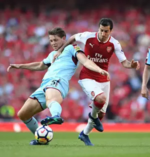 Arsenal's Mkhitaryan Clashes with Burnley's Tarkowski in Intense Premier League Showdown