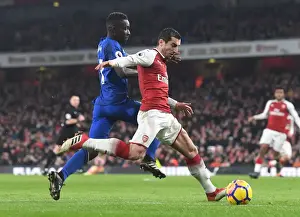 Arsenal V Everton 2017-18 Prints: Arsenal's Mkhitaryan Clashes with Everton's Martina in Premier League Showdown