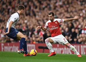 Images Dated 2nd December 2018: Arsenal's Mkhitaryan Clashes with Tottenham's Foyth in Intense Premier League Showdown
