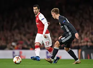 Arsenal V CSKA Moscow 2017-18 Prints: Arsenal's Mkhitaryan Fends Off CSKA's Kuchaev in Europa League Quarterfinal Clash