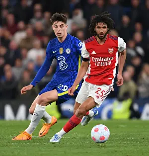 Arsenal's Mo Elneny Battles Past Chelsea's Kai Havertz in Premier League Clash