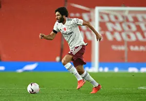 Manchester United V Arsenal 2020-21 Prints: Arsenal's Mo Elneny at Empty Old Trafford: 2020-21 Premier League Showdown Between Arsenal and Manchester United