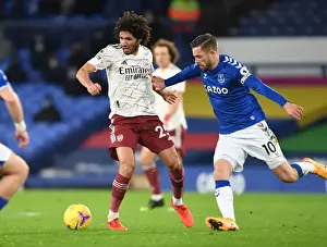 Everton V Arsenal 2020-21 Prints: Arsenal's Mo Elneny Outmaneuvers Everton's Gylfi Sigurdsson in Premier League Clash