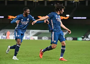 Arsenal's Mohamed Elneny and Ainsley Maitland-Niles Celebrate Goals against Dundalk in Europa League