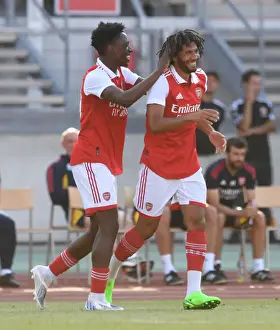 Arsenal's Mohamed Elneny and Albert Sambi Lokonga Celebrate Goal Against 1. FC Nurnberg in Pre-Season Friendly