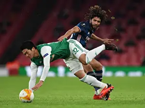 Arsenal V SK Rapid Wien 2020-21 Prints: Arsenal's Mohamed Elneny Fouls Kitagawa in Europa League Clash vs Rapid Wien