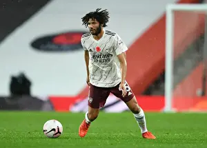 Arsenal's Mohamed Elneny at Manchester United's Old Trafford: 2020-21 Premier League Match Amidst Coronavirus Restrictions