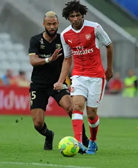 Lens V Arsenal 2016-17 Prints: Arsenal's Mohamed Elneny Overpowers Lens John Bostock in Pre-Season Clash