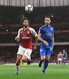 Arsenal V Leicester City 2017-18 Prints: Arsenal's Mohamed Elneny vs. Leicester's Christian Fuchs: A Premier League Battle