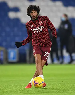 Brighton And Hove Albion V Arsenal 2020-21 Prints: Arsenal's Mohamed Elneny Warming Up Ahead of Brighton & Hove Albion Clash (Premier League 2020-21)