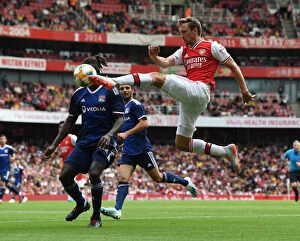 Emirates Cup Collection: Arsenal's Monreal in Action: Arsenal vs. Olympique Lyonnais at the Emirates Cup 2019