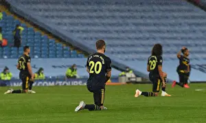 Manchester City V Arsenal 2019-20 Prints: Arsenal's Mustafi Kneels in Solidarity: Manchester City vs