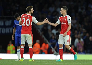Arsenal V Chelsea 2016-17 Prints: Arsenal's Mustafi and Koscielny in Action: Arsenal vs. Chelsea (2016-17)