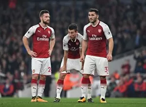 Arsenal v West Bromwich Albion 2017-18 Collection: Arsenal's Mustafi, Koscielny, and Kolasinac in Action against West Bromwich Albion (2017-18)