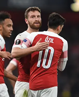 Arsenal V BATE Borisov 2018-19 Prints: Arsenal's Mustafi and Ozil Celebrate Goals in Europa League Victory over BATE Borisov
