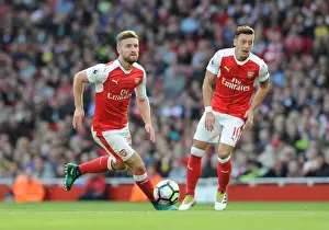 Arsenal V Swansea City 2016-17 Prints: Arsenal's Mustafi and Ozil: A Premier League Showdown - Arsenal vs Swansea City (2016-17)