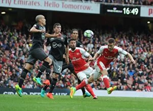 Images Dated 10th September 2016: Arsenal's Mustafi Stands Firm Against Southampton's Romeu and Fonte