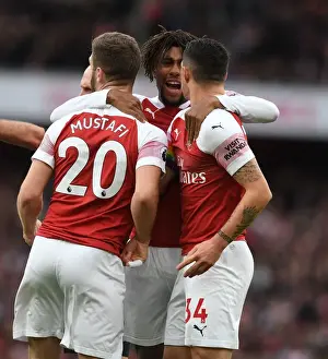 Arsenal's Mustafi, Xhaka, and Iwobi Celebrate Penalty Against Tottenham