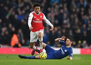 Arsenal v Chelsea 2019-20 Collection: Arsenal's Nelson Clashes with Chelsea's Jorginho: A Premier League Showdown at Emirates Stadium