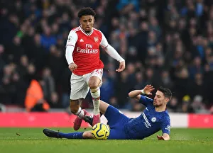 Arsenal V Chelsea 2019-20 Prints: Arsenal's Nelson Clashes with Chelsea's Jorginho: A Premier League Showdown at Emirates Stadium (December 2019)