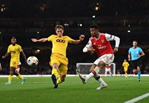Arsenal v Standard Liege 2019-20 Collection: Arsenal's Nelson Clashes with Vojvoda in Europa League Showdown at Emirates Stadium