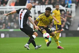 Arsenal's Nelson Faces Shelvey Pressure in Newcastle Clash (Premier League 2019-20)