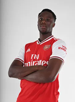 Arsenal Photocall 2019-20 Prints: Arsenal's Newest Recruit, James Olayinka, Poses at Arsenal's 2019-20 Photocall
