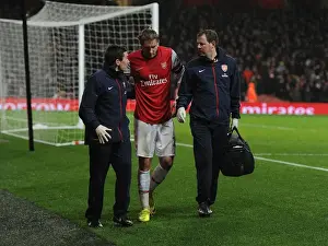 Arsenal V Cardiff City 2013-14 Prints: Arsenal's Nicklas Bendtner Receives Medical Attention During Arsenal vs