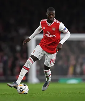 Arsenal V Vitoria Club 2019-20 Prints: Arsenal's Nicolas Pepe in Action: Arsenal FC vs
