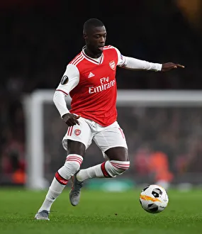 Arsenal V Vitoria Club 2019-20 Prints: Arsenal's Nicolas Pepe in Action: Arsenal vs